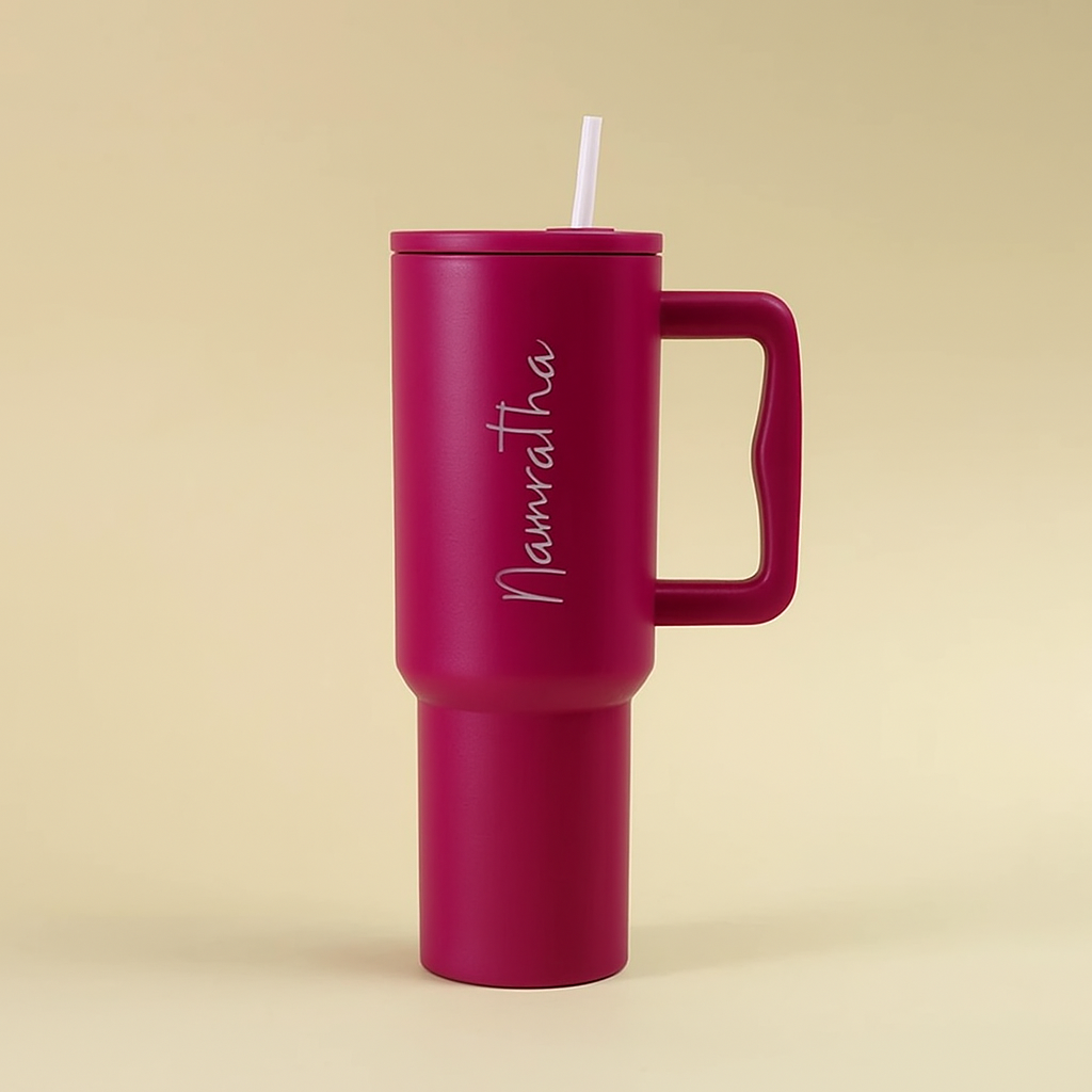 dark pink tumbler with straw