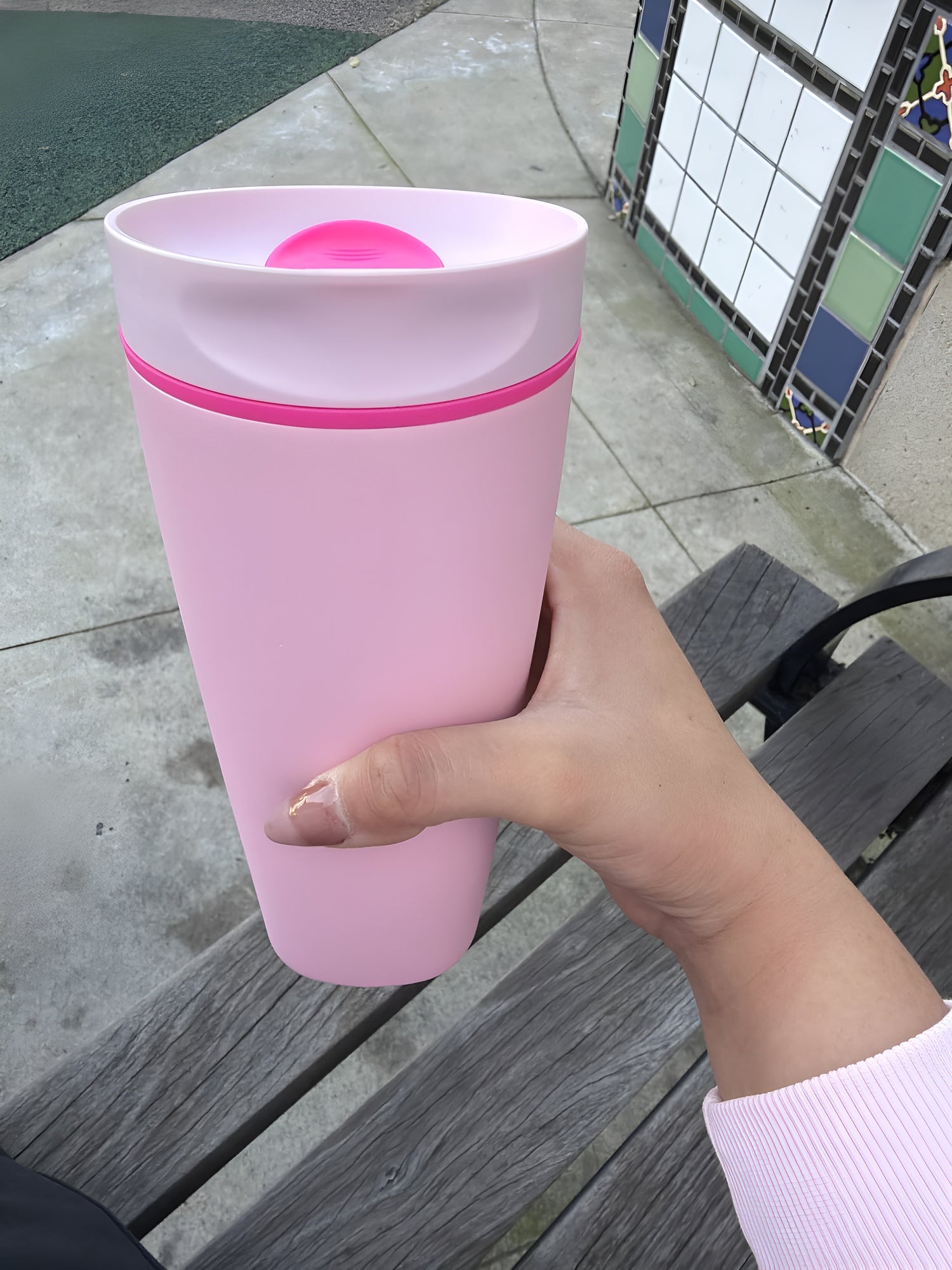 owala smooth sip slider 20 oz Holding Hand