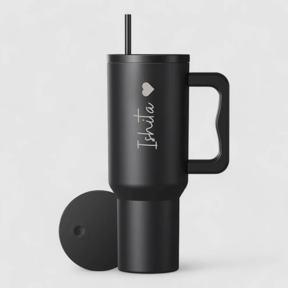 black tumbler with straw