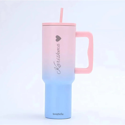 pink and blue tumbler with straw