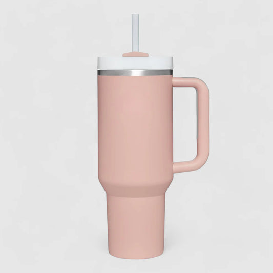 Pink tumbler with a handle and straw
